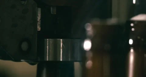 Beer bottle being closed with crown cap on automated line in brewery Video stock 335143349