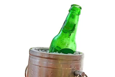 Beer bottle in ice bucket, isolated on white Stock Photos