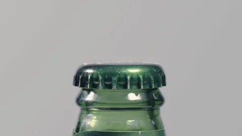 Beer Bottle Lid rotating Stock-Footage 128826899