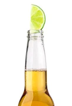 Beer bottle with lime slice Stock Photos