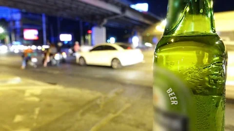 Beer Bottle On Roadside Night Time Lapse Stock Video Pond5