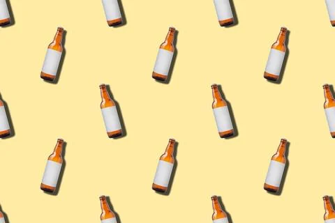 Beer bottle seamless pattern on yellow background 写真素材