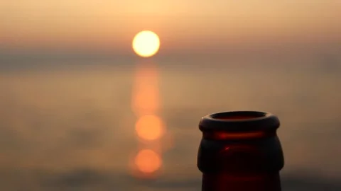 Beer Bottle on Sunset (slow motion) Stock Footage 245455938