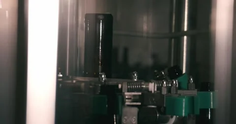 Beer bottles being cleaned before filling in Berlin brewery factory Stock-Footage 335142406