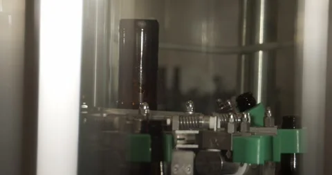 Beer bottles being cleaned before filling in Berlin brewery factory Video stock 335142407