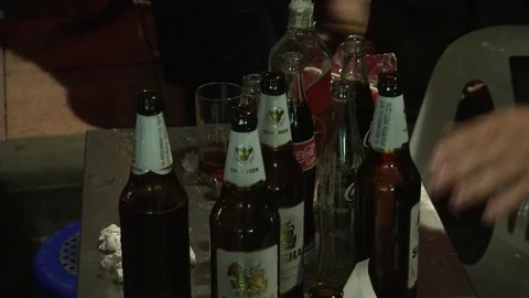 Beer Bottles on Table in Thailand 스톡 동영상 69876884