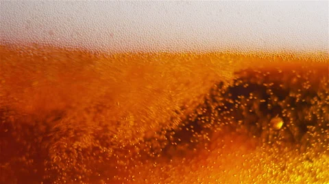 Beer Bubbles And Foam. Slow Motion Wave Stock Footage