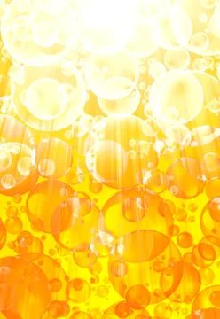 Beer bubbles on a bright gold background Stock Photos