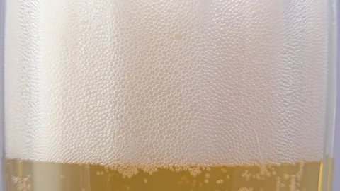 Beer bubbles in a glass close-up. timelapse Stock Footage 123860399