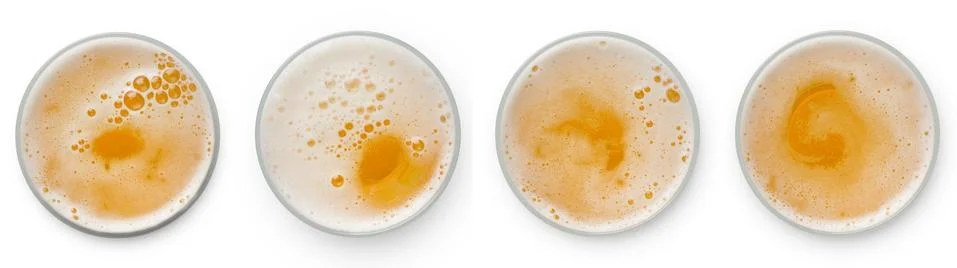 Beer bubbles in glass cup on white background. top view collection isolated o Stock Photos