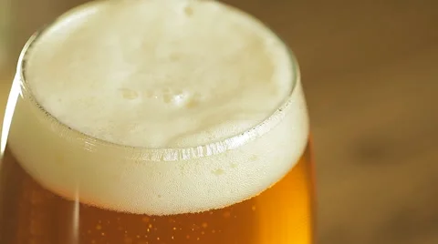 Beer bubbles in a glass Stock Footage 63007340
