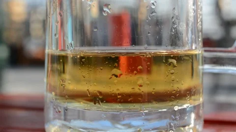 Beer bubbles in a glass Stock Footage 77247301