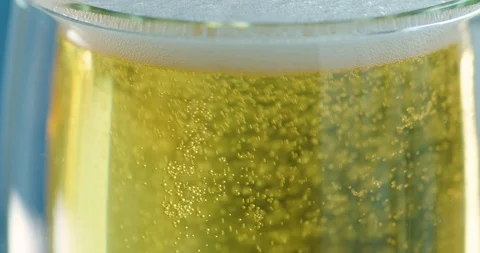 Beer bubbles in a glass Stock Footage 99732026