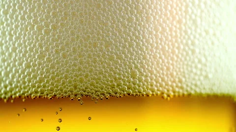 Beer bubbles in a glass Stock Footage 233142830