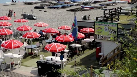Beer, cafe on beach with boat Stock-Footage 138066151