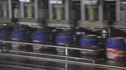 Beer cans being Capped Stock Footage 29645588