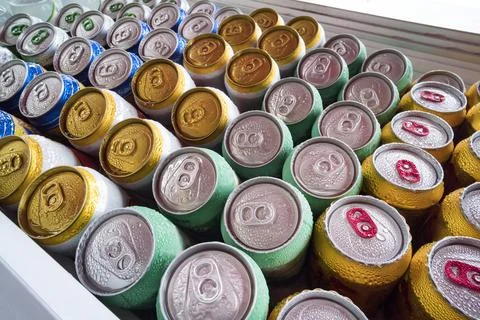 Beer cans Fresh from the fridge. Lots of aluminum cans in the ice in the open Stock Photos