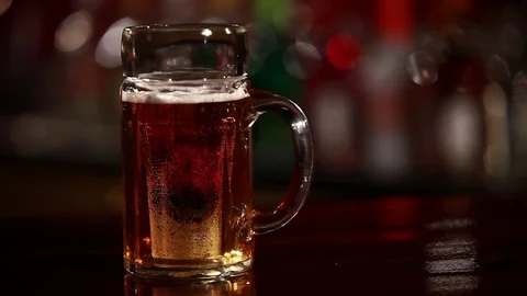 Beer cocktail Deep bomb on the table. Stock Footage 80309244