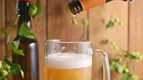 Beer. Cold Craft light Beer in a glass with water drops. Video stock 138832660