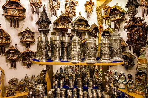 Beer cups and cuckoo clocks in a souvenir shop in Munich, Bavaria, Germany Stock Photos
