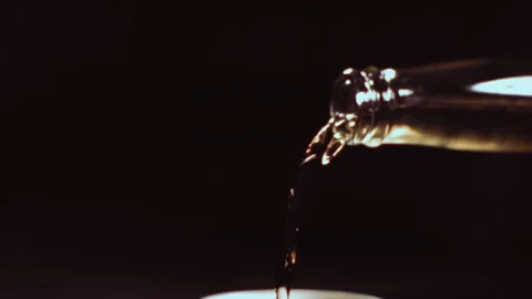 Beer falls slowly from the bottle Stock Footage 274285148