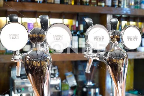 Beer faucets in a bar Stock Photos