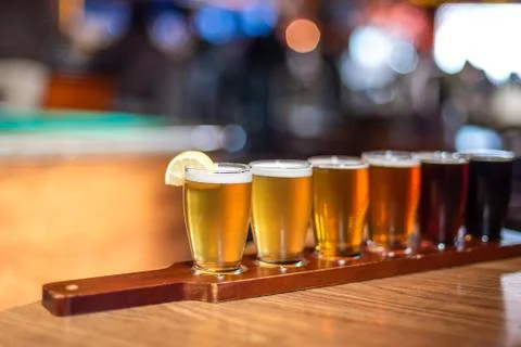 Beer flight at microbrewery Stockfoto's