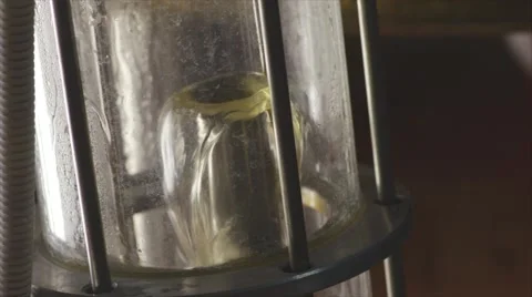 Beer flows into a glass flask Stock Footage 61964984