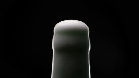 Beer foam escapes from bootle Video stock 153933356