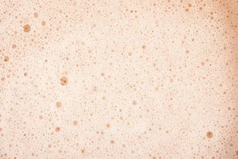 Beer foam texture close up as background. Stock Photos