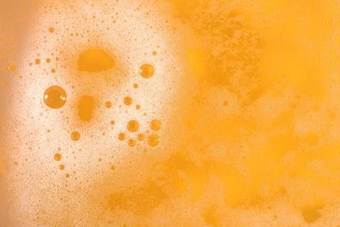 Beer foam texture close up as background. Stock Photos