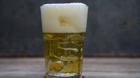 Beer in a glass. Stock Footage 128043929