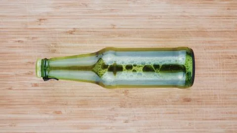 Beer in green bottle Stock Photos