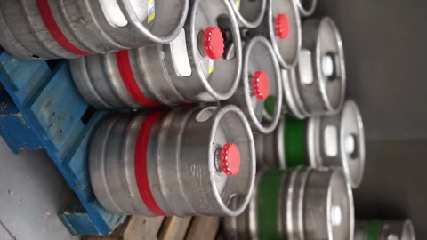 Beer in an iron barrel vertical video Stock Footage 258546349