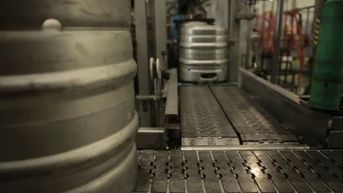 Beer keg on belt Stock Footage