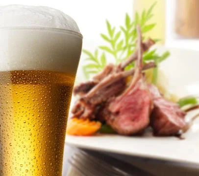 Beer with lamb rack Stock Photos