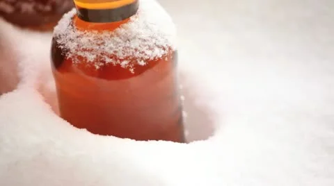 Beer left outside in snowy cold weather. 스톡 동영상 10864307