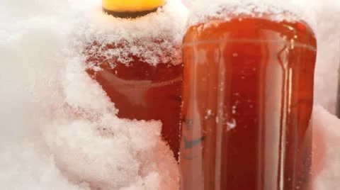 Beer left outside in snowy cold weather. 스톡 동영상 10864319