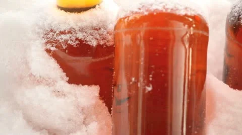 Beer left outside in snowy cold weather. Stockbeeldmateriaal 10864328