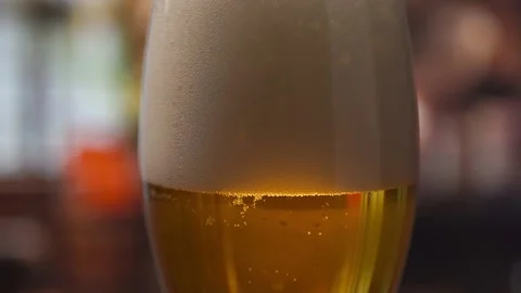 Beer with a lot of foam. close-up Stock Footage 158753699