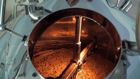 Beer making in craft brewery, close up. Close up top view kettle with beer Stock Footage 129425468