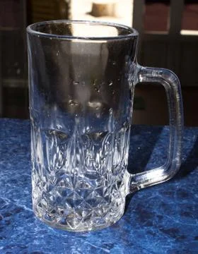 Beer mug on the bar Stock Photos