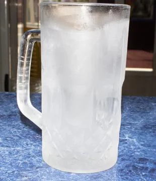 Beer mug on the bar Stock Photos