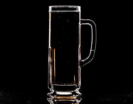 Beer mug on black background Stock Photos