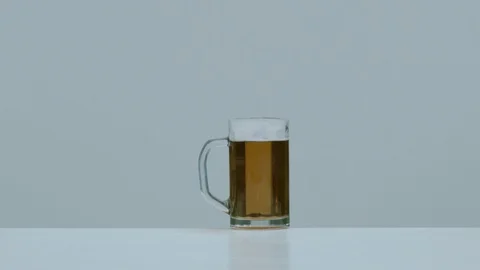 Beer mug exploding, Ultra Slow Motion Video stock 86696828