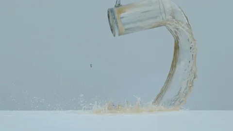Beer mug falling on a wet surface, Ultra Slow Motion Video stock 86578457
