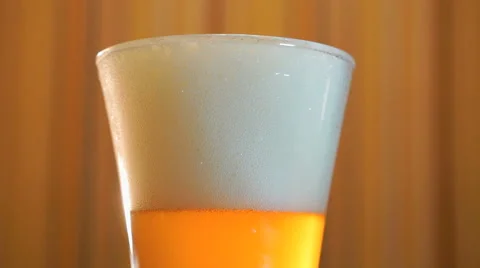 Beer mug light beer is on the table Stock Footage 62601555