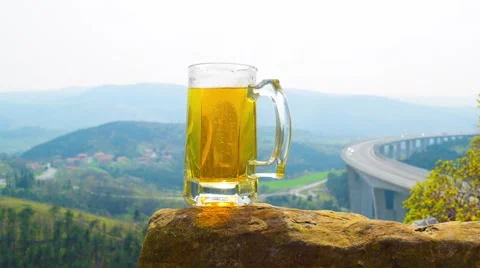 Beer mug at panoramic landscape background Stock Footage 61894356
