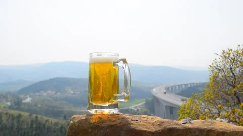 Beer mug at panoramic landscape background Stock-Footage 61894633
