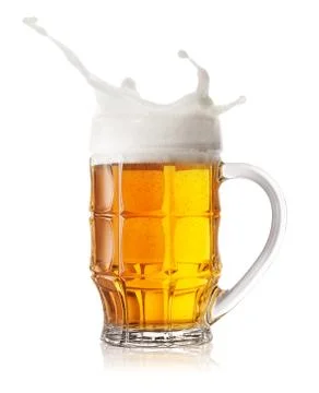 Beer mug splash Stock Photos